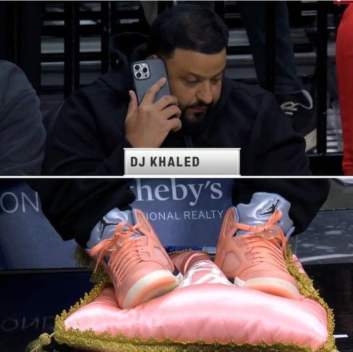 Dj Khaled standing on LV Pillows at the Miami Heat Game 